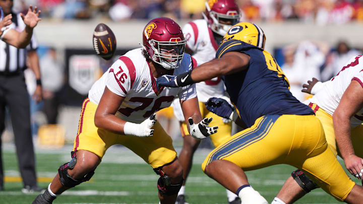 Oct 28, 2023; Berkeley, California, USA; USC Trojans offensive lineman Mason Murphy (76) blocks California Golden Bears defensive lineman Darius Long Jr. (right) during the first quarter at California Memorial Stadium. Mandatory Credit: Darren Yamashita-Imagn Images