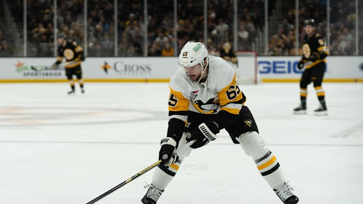 Jan 11, 2026; Boston, Massachusetts, USA; Pittsburgh Penguins defenseman Erik Karlsson (65) skates with the puck during the first period of the game against the Boston Bruins at TD Garden. Mandatory Credit: Natalie Reid-Imagn Images