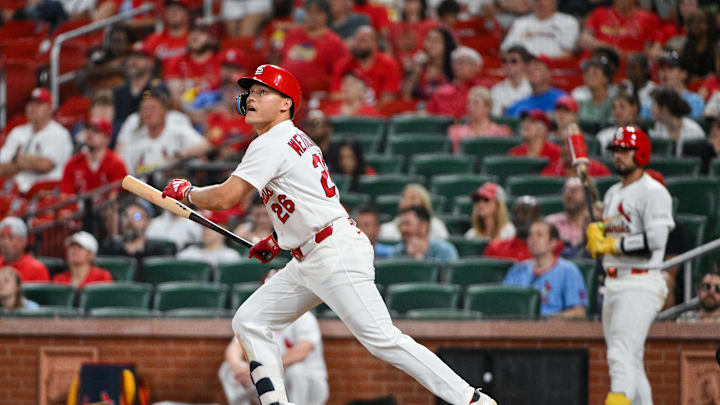 Apr 14, 2026; St. Louis, Missouri, USA; St. Louis Cardinals second baseman JJ Wetherholt (26) hits a two run home run for his second home run of the game against the Cleveland Guardians during the eighth inning at Busch Stadium. Mandatory Credit: Jeff Curry-Imagn Images
