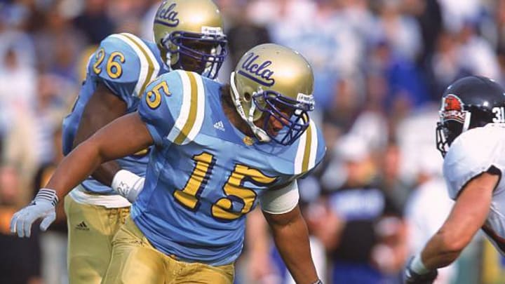 Former Bruin Ed Stansbury lead block's for current UCLA head coach DeShaun Foster