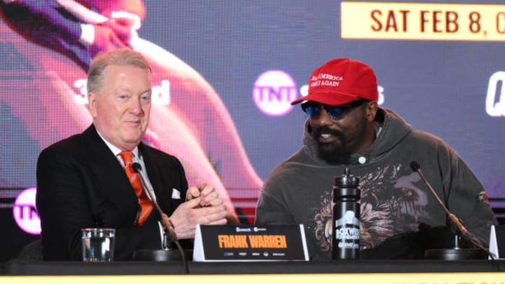 Frank Warren and Derek Chisora interact during the Derek Chisora v Otto Wallin 'The Last Dance' Press Conference at Co-op Live
