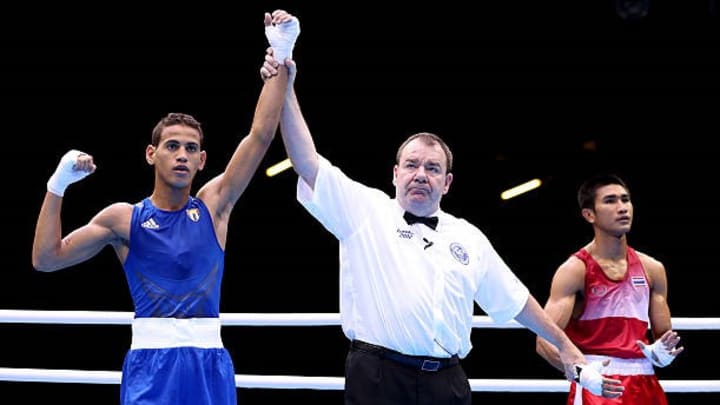 Cuban Robeisy Ramirez (L) celebrates his victory over Chatchai Butdee of Thailand during the Men's Fly (52kg) Boxing in the London 2012 Olympic Games in 2012 in London, England. Ramirez suffered an orbital injury during his rematch with Espinoza Cuban Robeisy Ramirez (L) celebrates his victory over Chatchai Butdee of Thailand during the Men's Fly (52kg) Boxing in the London 2012 Olympic Games in 2012 in London, England. Ramirez suffered an orbital injury during his rematch with Espinoza