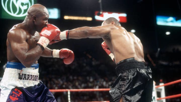 Evander Holyfield and Mike Tyson fight for WBA World Heavyweight Title on June 28,1997 at the MGM Grand Garden in Las Vegas, Nevada. The Fight was stop in the third round and Tyson was disqualified for biting Holyfield on both ears