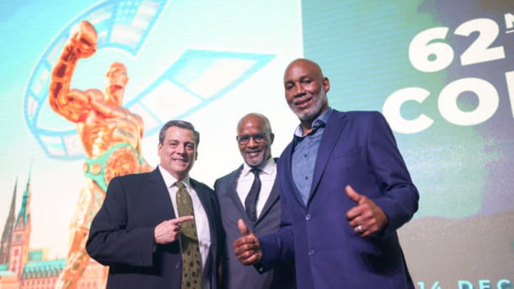 09 December 2024, Hamburg: Legends Gala Night, at the Hotel Grand Elysee. Award winner Lennox Lewis (r-l), stands next to Michael Moorer and Mauricio Sulaiman, President of the WBC, in the ballroom after receiving his award 09 December 2024, Hamburg: Legends Gala Night, at the Hotel Grand Elysee. Award winner Lennox Lewis (r-l), stands next to Michael Moorer and Mauricio Sulaiman, President of the WBC, in the ballroom after receiving his award