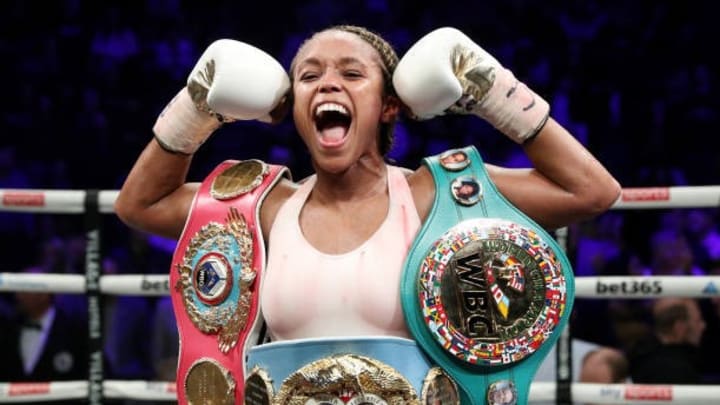 Natasha Jonas celebrates with the WBC, WBO, IBF World Super-weight belts after victory in the championship fight. She will fight Price next year in title unification contest Natasha Jonas celebrates with the WBC, WBO, IBF World Super-weight belts after victory in the championship fight. She will fight Price next year in title unification contest