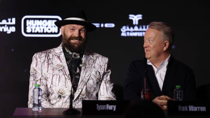 Tyson Fury with his promoter Frank Warren at a press conference as part of Oleksandr Usyk v Tyson Fury 2 at Via Riyadh on December 19, 2024. Warren claims Fury defeated Usyk. Getty Images.