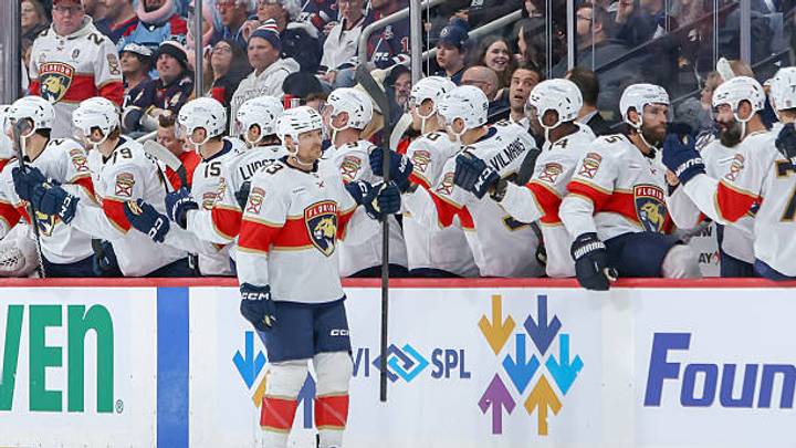 WINNIPEG, CANADA - OCTOBER 27: Sam Reinhart #13 of the Florida Panthers celebrates his second period goal against the Winnipeg Jets with teammates at the bench at the Canada Life Centre on October 27, 2026 in Winnipeg, Manitoba, Canada. (Photo by Jonathan Kozub/NHLI via Getty Images)
