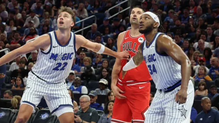 Franz Wagner, Wendell Carter Jr., Nikola Vucevic go for rebound