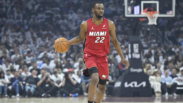 Apr 20, 2025; Cleveland, Ohio, USA; Miami Heat forward Andrew Wiggins (22) brings the ball up court in the first quarter against the Cleveland Cavaliers at Rocket Arena. Mandatory Credit: David Richard-Imagn Images