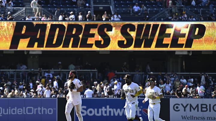 Apr 30, 2025; San Diego, California, USA; San Diego Padres players leave the field after the defeating the San Francisco Giants 5-3 at Petco Park. Mandatory Credit: Denis Poroy-Imagn Images