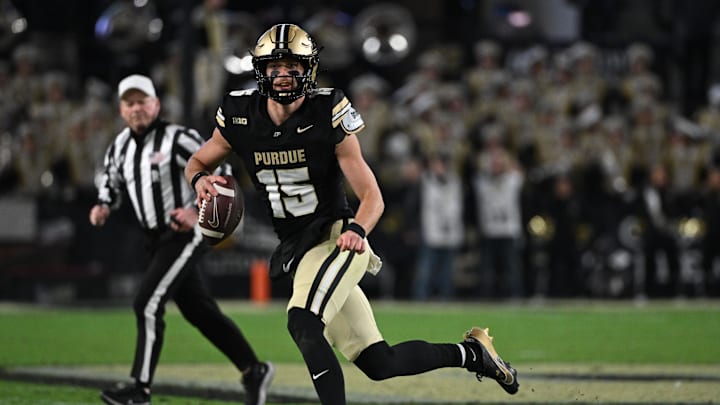 Nov 16, 2024; West Lafayette, Indiana, USA; Purdue Boilermakers quarterback Ryan Browne (15) runs the ball during the second half against the Penn State Nittany Lions at Ross-Ade Stadium. Nov 16, 2024; West Lafayette, Indiana, USA; Purdue Boilermakers quarterback Ryan Browne (15) runs the ball during the second half against the Penn State Nittany Lions at Ross-Ade Stadium.