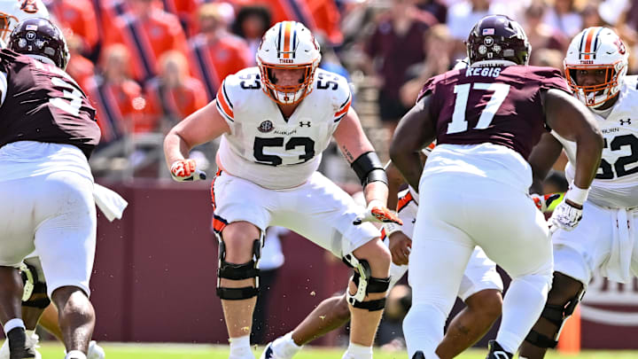 Sep 23, 2023; College Station, Texas, USA; Auburn Tigers offensive lineman Gunner Britton (53) in action during the second quarter against the Texas A&M Aggies at Kyle Field. Mandatory Credit: Maria Lysaker-Imagn Images