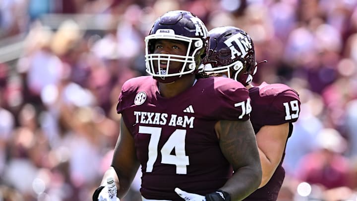Sep 23, 2023; College Station, Texas, USA; Texas A&M Aggies offensive lineman Aki Ogunbiyi (74) reacts during the third quarter against the Auburn Tigers at Kyle Field. Mandatory Credit: Maria Lysaker-Imagn Images