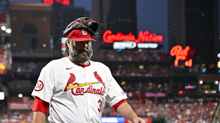 Jul 30, 2024; St. Louis, Missouri, USA;  St. Louis Cardinals starting pitcher Lance Lynn (31) walks off the field after the fifth inning against the Texas Rangers at Busch Stadium. Mandatory Credit: Jeff Curry-Imagn Images