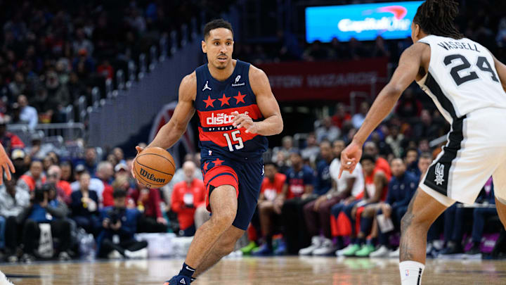 Feb 10, 2025; Washington, District of Columbia, USA; Washington Wizards guard Malcolm Brogdon (15) handles the ball during the third quarter against San Antonio Spurs guard Devin Vassell (24) at Capital One Arena. Mandatory Credit: Reggie Hildred-Imagn Images