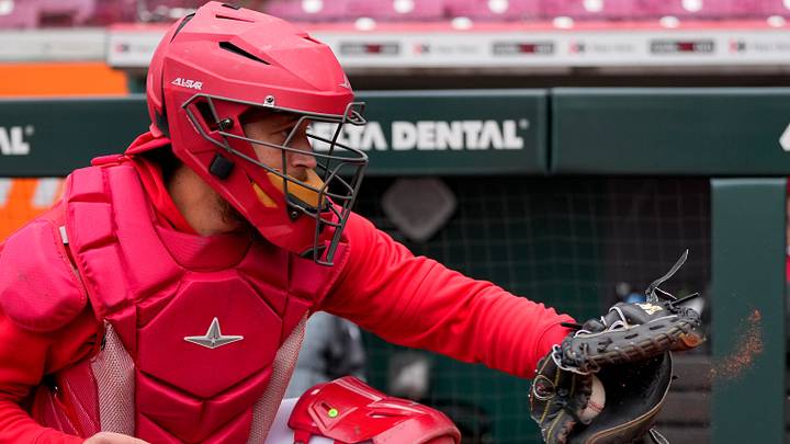 Cincinnati Reds catcher PJ Higgins (57) catches a pitch from the machine during the final preseason workout ahead of Opening Day at Great American Ball Park in downtown Cincinnati on Wednesday, March 27, 2024. Cincinnati Reds catcher PJ Higgins (57) catches a pitch from the machine during the final preseason workout ahead of Opening Day at Great American Ball Park in downtown Cincinnati on Wednesday, March 27, 2024.