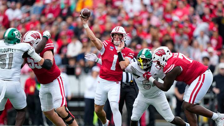 Sep 19, 2026; Madison, Wisconsin, USA;  Wisconsin Badgers quarterback Colton Joseph (1) throws a pass during the first quarter against the Eastern Michigan Eagles at Camp Randall Stadium. Mandatory Credit: Jeff Hanisch-Imagn Images