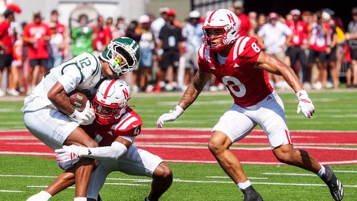 Ohio wide receiver Eian Pugh (12) is tackled by Nebraska defensive back Jamir Conn during the second quarter at Memorial Stadium. Ohio wide receiver Eian Pugh (12) is tackled by Nebraska defensive back Jamir Conn during the second quarter at Memorial Stadium.