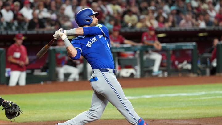 Toronto Blue Jays outfielder Kevin Kiermaier (39) hits a grand slam home run against the Arizona Diamondbacks during the fourth inning at Chase Field. Toronto Blue Jays outfielder Kevin Kiermaier (39) hits a grand slam home run against the Arizona Diamondbacks during the fourth inning at Chase Field.