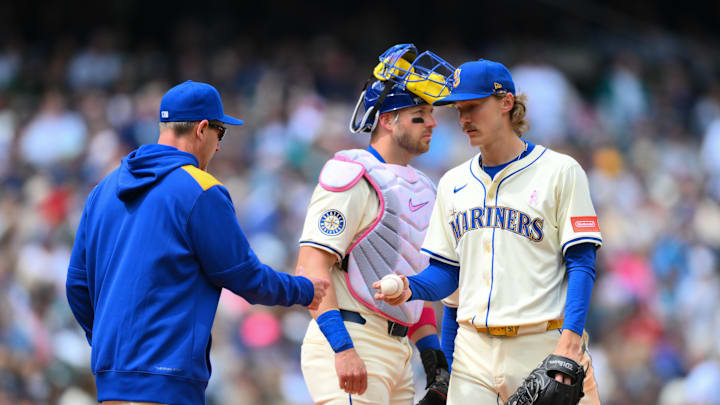 Seattle Mariners manager Dan Wilson (6) pulls Seattle Mariners starting pitcher Bryce Miller (50) from the game during the sixth inning against the Toronto Blue Jays at T-Mobile Park on May 11.