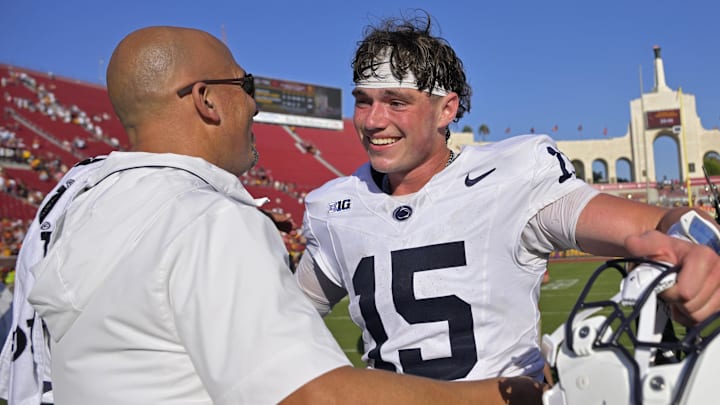 Oct 12, 2024; Los Angeles, California, USA; Penn State Nittany Lions quarterback Drew Allar (15) is is congratulated by head coach James Franklin after defeating the USC Trojans in overtime at United Airlines Field at the Los Angeles Memorial Coliseum. Oct 12, 2024; Los Angeles, California, USA; Penn State Nittany Lions quarterback Drew Allar (15) is is congratulated by head coach James Franklin after defeating the USC Trojans in overtime at United Airlines Field at the Los Angeles Memorial Coliseum.