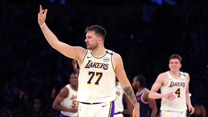 Mar 2, 2025; Los Angeles, California, USA; Los Angeles Lakers guard Luka Doncic (77) reacts to a play during the third quarter against the LA Clippers at Crypto.com Arena. Mandatory Credit: Jason Parkhurst-Imagn Images