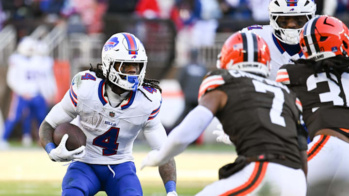 Dec 21, 2025; Cleveland, Ohio, USA;  Buffalo Bills running back James Cook III (4) carries the ball against the Cleveland Browns during the second half at Huntington Bank Field. Mandatory Credit: Ken Blaze-Imagn Images