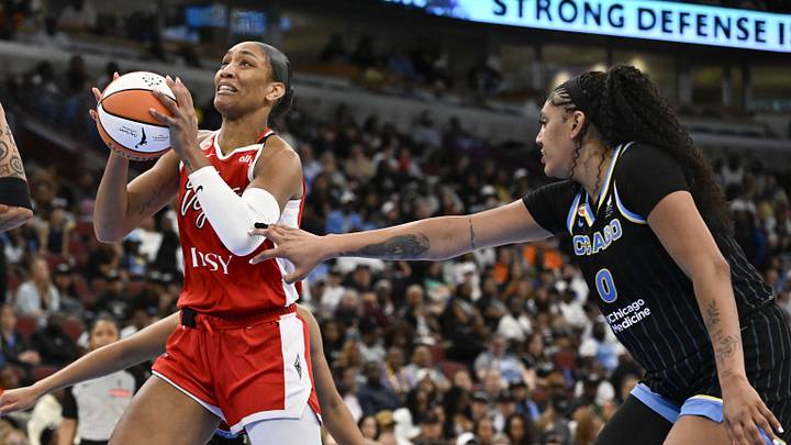 Jun 28, 2026; Chicago, Illinois, USA;  Las Vegas Aces center A'ja Wilson (22) drives to the basket against Chicago Sky forward-center  Azura Stevens (30) during the second half at United Center. Mandatory Credit: Matt Marton-Imagn Images