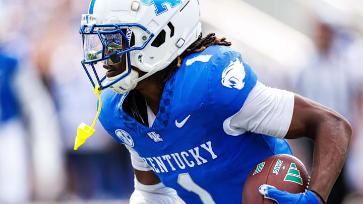 Sep 21, 2024; Lexington, Kentucky, USA; Kentucky Wildcats defensive back Maxwell Hairston (1) intercepts an Ohio Bobcats pass and carries it towards the end zone during the third quarter at Kroger Field. Mandatory Credit: Jordan Prather-Imagn Images