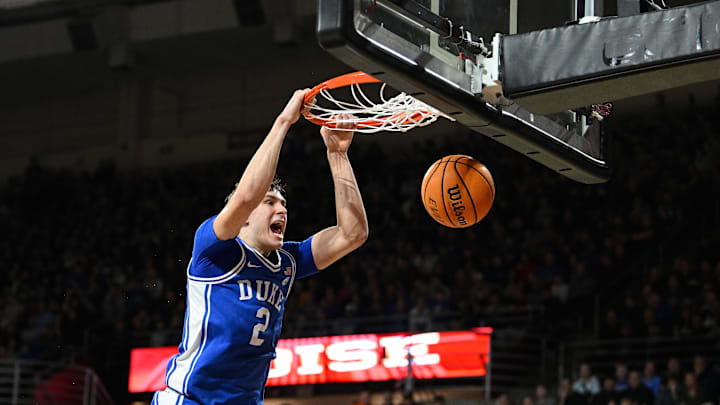 Jan 18, 2025; Chestnut Hill, Massachusetts, USA; Duke Blue Devils guard Cooper Flagg (2) dunks the ball against the Boston College Eagles during the first half at Conte Forum. Mandatory Credit: Eric Canha-Imagn Images