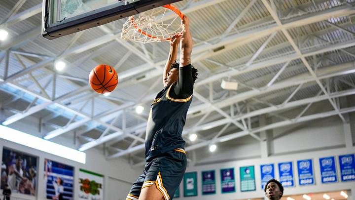 Wheeler Wildcats forward Colben Landrew (3) dunks during the fourth quarter of a City of Palms Classic first round game against the Bishop McNamara Mustangs at Suncoast Credit Union Arena in Fort Myers, Fla., on Friday, Dec. 19, 2025. Wheeler Wildcats forward Colben Landrew (3) dunks during the fourth quarter of a City of Palms Classic first round game against the Bishop McNamara Mustangs at Suncoast Credit Union Arena in Fort Myers, Fla., on Friday, Dec. 19, 2025.