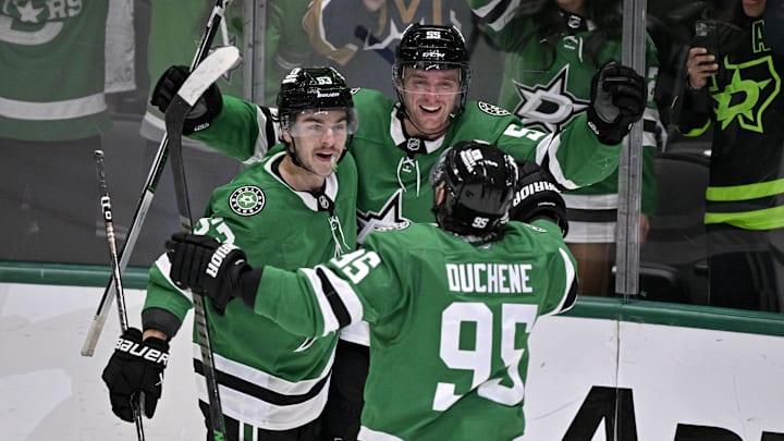 Jan 4, 2025; Dallas, Texas, USA; Dallas Stars center Matt Duchene (95) and center Wyatt Johnston (53) and defenseman Thomas Harley (55) celebrate on the ice after the Stars defeat the Utah Hockey Club in the overtime period at the American Airlines Center. Mandatory Credit: Jerome Miron-Imagn Images