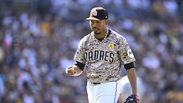 Sep 22, 2024; San Diego, California, USA; San Diego Padres relief pitcher Jeremiah Estrada (56) gestures after a strikeout to end the top of the eighth inning against the Chicago White Sox at Petco Park. Mandatory Credit: Orlando Ramirez-Imagn Images