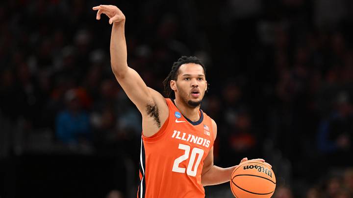 Mar 30, 2024; Boston, MA, USA; Illinois Fighting Illini forward Ty Rodgers (20) dribbles the ball against the Connecticut Huskies in the finals of the East Regional of the 2024 NCAA Tournament at TD Garden. Mandatory Credit: Brian Fluharty-Imagn Images Mar 30, 2024; Boston, MA, USA; Illinois Fighting Illini forward Ty Rodgers (20) dribbles the ball against the Connecticut Huskies in the finals of the East Regional of the 2024 NCAA Tournament at TD Garden. Mandatory Credit: Brian Fluharty-Imagn Images