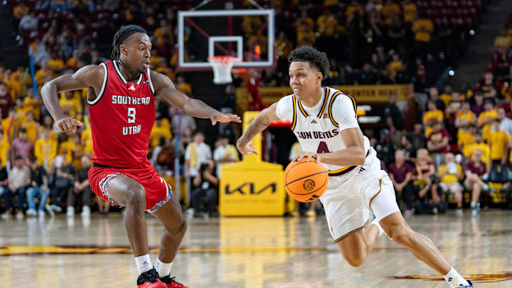Arizona State Sun Devils Bryce Ford (4) runs with the ball against Southern Utah Thunderbirds Jalen (Roc) Lee (9) during a game at Desert Financial Arena in Tempe on Nov. 4, 2025.