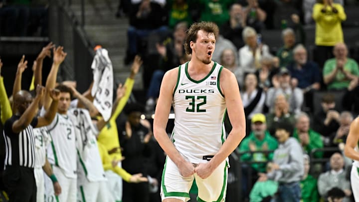 Feb 16, 2025; Eugene, Oregon, USA; Oregon Ducks center Nate Bittle (32) reacts to a made three point shot against the Rutgers Scarlet Knights during the second half at Matthew Knight Arena. Mandatory Credit: Craig Strobeck-Imagn Images