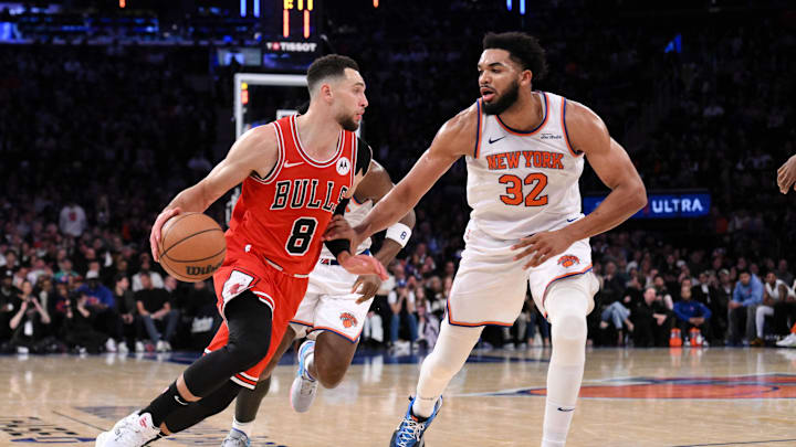 Nov 13, 2024; New York, New York, USA; Chicago Bulls guard Zach LaVine (8) drives to the basket while being defended by New York Knicks center Karl-Anthony Towns (32) during the second half at Madison Square Garden. Mandatory Credit: John Jones-Imagn Images