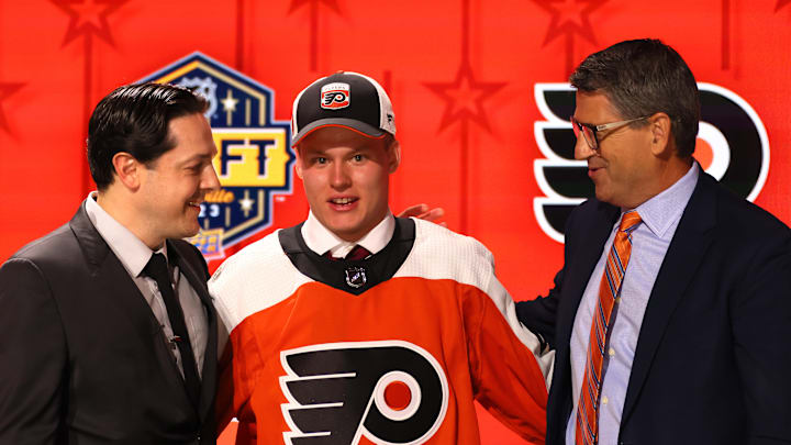 Daniel Briere and Keith Jones with 2023 First Round pick, Matvei Michkov