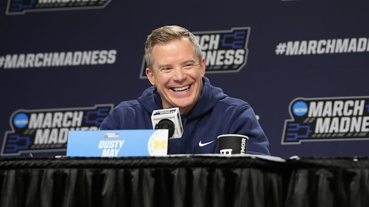 Mar 18, 2026; Buffalo, NY, USA; Michigan Wolverines head coach Dusty May answers questions during the press conference prior to their practice session ahead of the first round of the men's 2026 NCAA Tournament at Keybank Center. Mandatory Credit: Gregory Fisher-Imagn Images