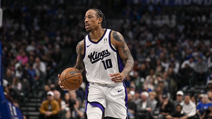 Feb 10, 2025; Dallas, Texas, USA; Sacramento Kings forward DeMar DeRozan (10) brings the ball up court against the Dallas Mavericks during the second half at the American Airlines Center. Mandatory Credit: Jerome Miron-Imagn Images