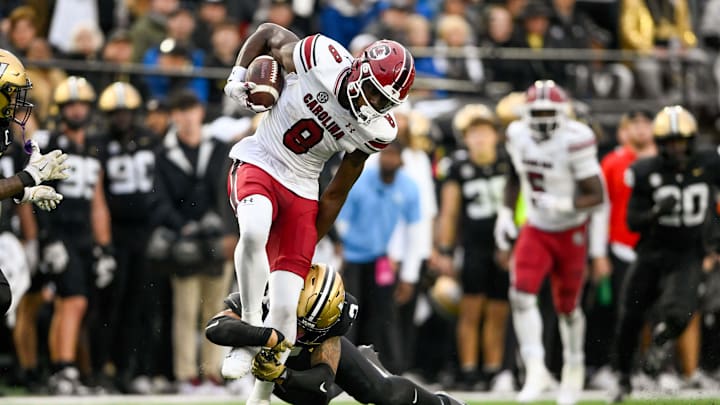 Nov 9, 2024; Nashville, Tennessee, USA; South Carolina Gamecocks wide receiver Nyck Harbor (8) breaks the tackle of Vanderbilt Commodores linebacker Randon Fontenette (2) during the first half at FirstBank Stadium. Mandatory Credit: Steve Roberts-Imagn Images Nov 9, 2024; Nashville, Tennessee, USA; South Carolina Gamecocks wide receiver Nyck Harbor (8) breaks the tackle of Vanderbilt Commodores linebacker Randon Fontenette (2) during the first half at FirstBank Stadium. Mandatory Credit: Steve Roberts-Imagn Images