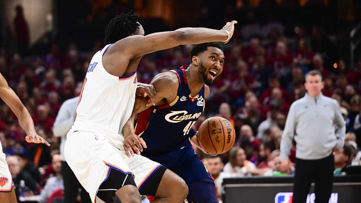 May 25, 2026; Cleveland, Ohio, USA; Cleveland Cavaliers guard Donovan Mitchell (45) drives the ball while defended by New York Knicks forward OG Anunoby (8) in the third quarter during game four of the eastern conference finals for the 2026 NBA playoffs at Rocket Arena. Mandatory Credit: Ken Blaze-Imagn Images May 25, 2026; Cleveland, Ohio, USA; Cleveland Cavaliers guard Donovan Mitchell (45) drives the ball while defended by New York Knicks forward OG Anunoby (8) in the third quarter during game four of the eastern conference finals for the 2026 NBA playoffs at Rocket Arena. Mandatory Credit: Ken Blaze-Imagn Images