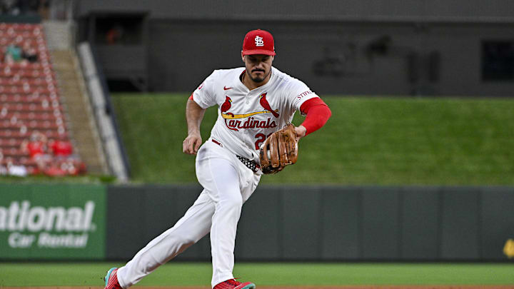 Sep 16, 2024; St. Louis, Missouri, USA;  St. Louis Cardinals third baseman Nolan Arenado (28) fields a ground ball against the Pittsburgh Pirates during the first inning at Busch Stadium. Mandatory Credit: Jeff Curry-Imagn Images