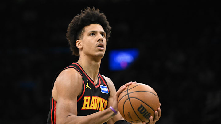 Jan 28, 2026; Boston, Massachusetts, USA; Atlanta Hawks forward Jalen Johnson (1) attempts a free-throw against the Boston Celtics during the first half at the TD Garden. Mandatory Credit: Brian Fluharty-Imagn Images