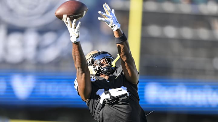 Aug 30, 2025; Nashville, Tennessee, USA;  Vanderbilt Commodores wide receiver Joseph McVay (15) makes a catch against the Charleston Southern Buccaneers during pre-game warmups at FirstBank Stadium. Mandatory Credit: Steve Roberts-Imagn Images