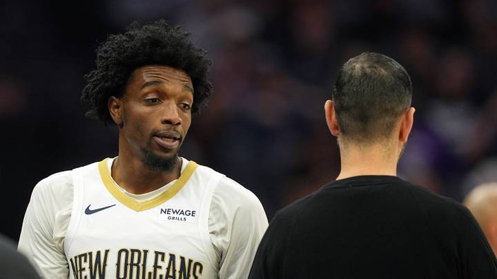 Apr 3, 2026; Sacramento, California, USA; New Orleans Pelicans forward Herbert Jones (left) talks with interim head coach James Borrego (right) during the first quarter against the Sacramento Kings at Golden 1 Center. Mandatory Credit: Darren Yamashita-Imagn Images