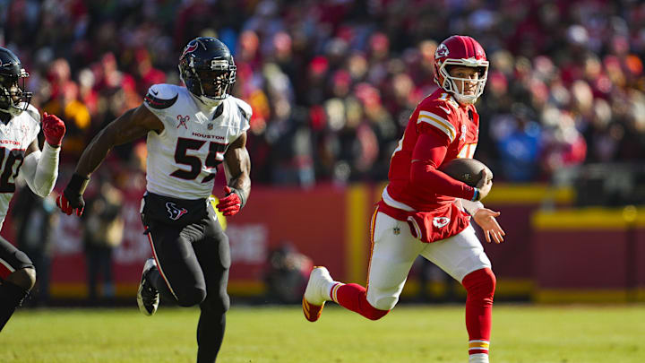 Dec 21, 2024; Kansas City, Missouri, USA; Kansas City Chiefs quarterback Patrick Mahomes (15) runs the ball against Houston Texans defensive end Danielle Hunter (55) during the first half at GEHA Field at Arrowhead Stadium. Dec 21, 2024; Kansas City, Missouri, USA; Kansas City Chiefs quarterback Patrick Mahomes (15) runs the ball against Houston Texans defensive end Danielle Hunter (55) during the first half at GEHA Field at Arrowhead Stadium.