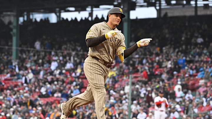 Apr 5, 2026; Boston, Massachusetts, USA; San Diego Padres third baseman Manny MacHado (13) celebrates his three run home run against the Boston Red Sox during the fifth inning at Fenway Park. Mandatory Credit: Eric Canha-Imagn Images Apr 5, 2026; Boston, Massachusetts, USA; San Diego Padres third baseman Manny MacHado (13) celebrates his three run home run against the Boston Red Sox during the fifth inning at Fenway Park. Mandatory Credit: Eric Canha-Imagn Images