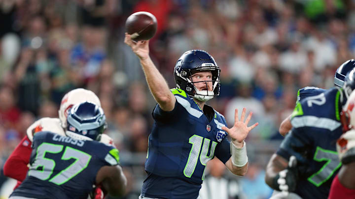 Sep 25, 2025; Glendale, Arizona, USA;  Seattle Seahawks quarterback Sam Darnold (14) throws a pass against the Arizona Cardinals in the third quarter at State Farm Stadium. Mandatory Credit: Joe Camporeale-Imagn Images