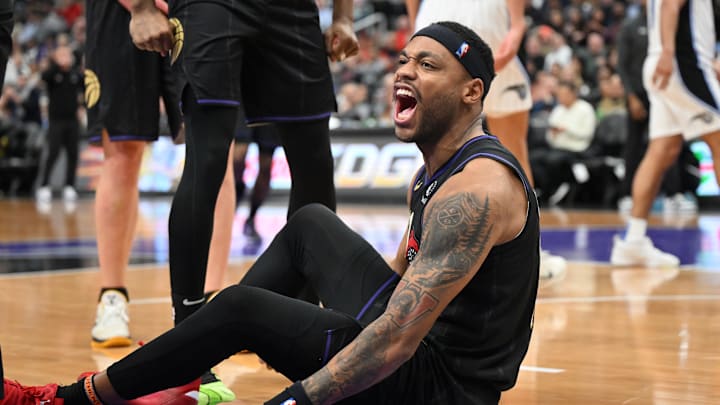 Jan 21, 2025; Toronto, Ontario, CAN;  Toronto Raptors guard Bruce Brown (11) reacts after a play in the second half against the Orlando Magic at Scotiabank Arena. Mandatory Credit: Dan Hamilton-Imagn Images